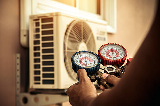 Professional Heat Pump Repair technician working in Aurora, MN